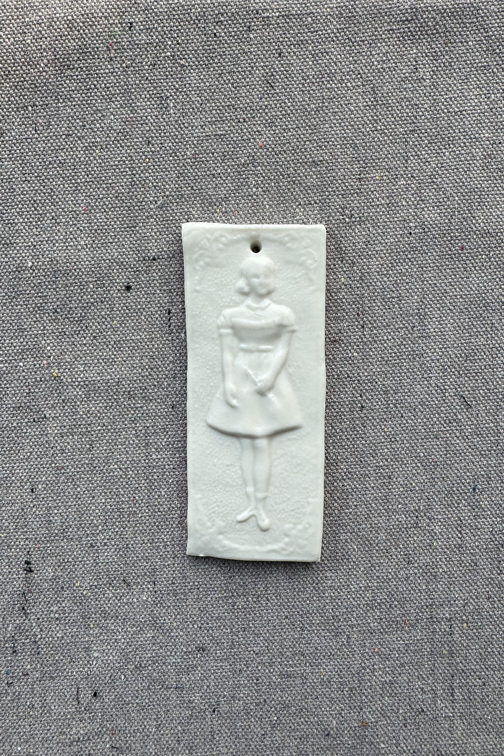 ceramic wall ornament - sq daughter